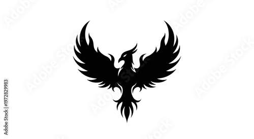 Silhouette of a mythical phoenix bird with spread wings on a white background.