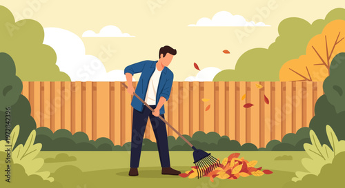 Man raking colorful autumn leaves in a backyard during fall season