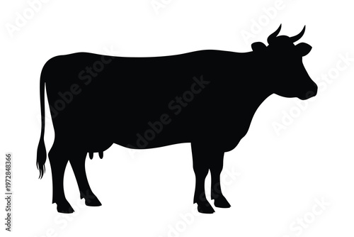 Black silhouette of a cow standing in profile farm animal illustration