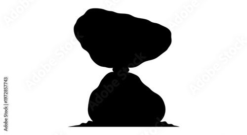 Balance of Nature: A silhouette of artfully balanced rocks, a testament to nature's equilibrium and the subtle beauty of geological formations. 