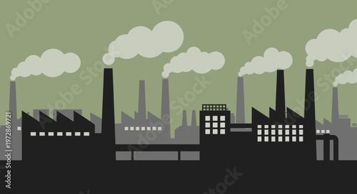 Industrial factory buildings with smoking chimneys polluting the environment.