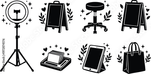Black and white icons of ring light easel stool file holder tablet and bag with hearts and leaves