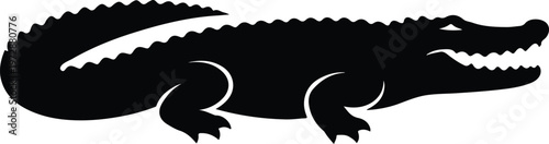 A black silhouette of an alligator lying in a relaxed pose