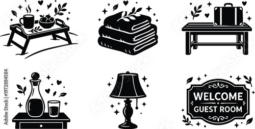 Black and white guest room welcome sign towels lamp and breakfast tray icons