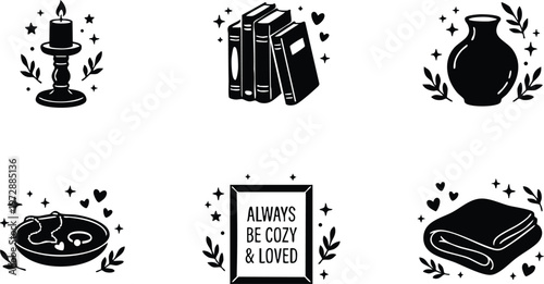 Black and white cozy home elements with candle books vase bowl framed phrase and blanket