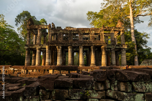 Fotografie Ancient temple ruins stand beneath golden afternoon light, Preah Khan, Angkor, C