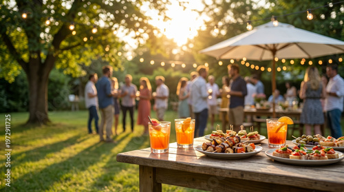 Outdoor party garden people appetizer cocktail table summer sunset string light outdoor party garden with people socializing, cocktail drink table with appetizer platter patio umbrella
