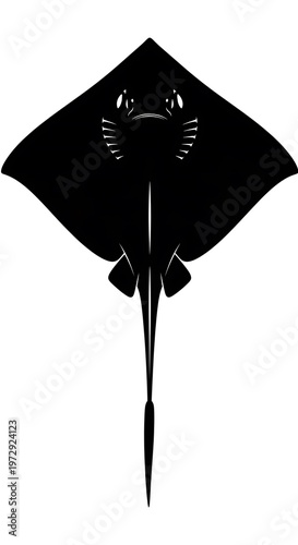 Black stingray fish swimming alone underwater.