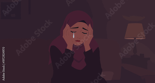 Sad woman crying alone in darkness.