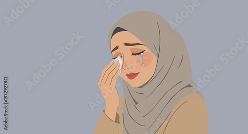 Woman wearing hijab crying sadness emotion.