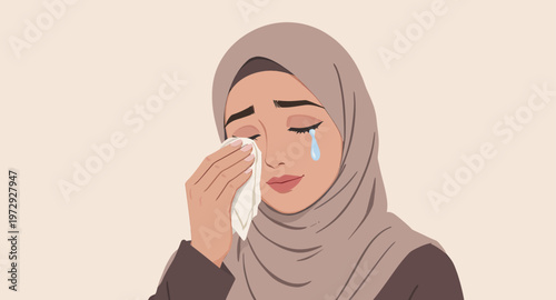 Sad woman crying and wiping tears.