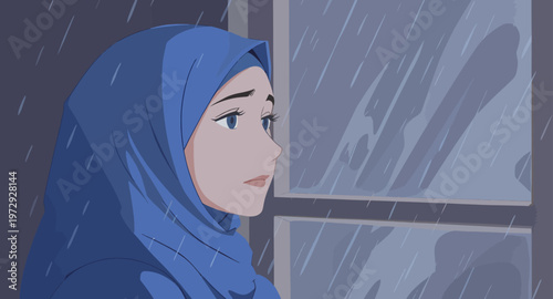 Woman wearing blue hijab looking out window on rainy day.