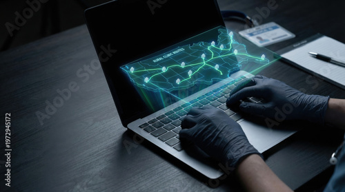 Rural clinic routes map hologram projected on laptop with hands typing, healthcare technology concept with digital network visualization