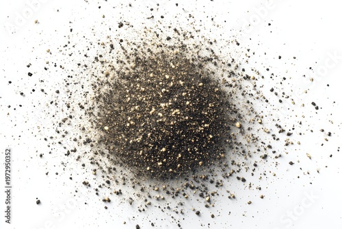 Close-up view of black chia seeds scattered on a white background.