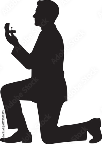 Black silhouette man kneeling holding ring