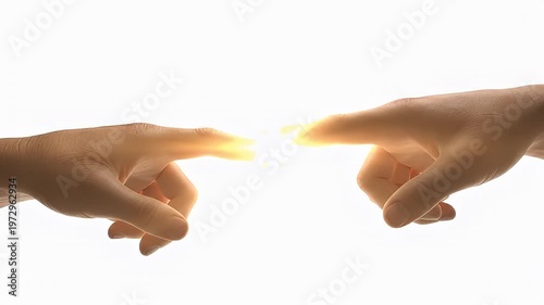 Hands almost touching with light.