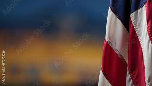American Flag: The Stars and Stripes wave proudly, their colors a vibrant symbol of national identity against a backdrop of the sky. 