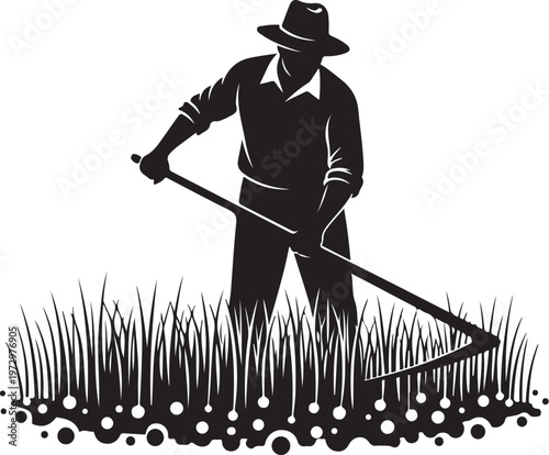 Black silhouette of man raking grass and soil