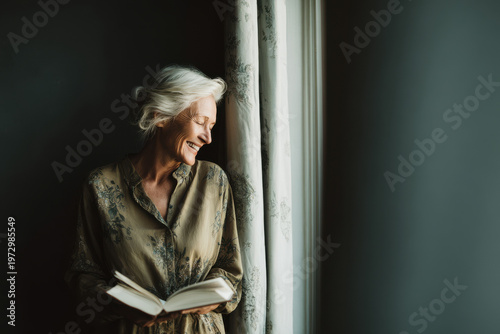 joyful child waves happily while sitting on colorful sled enjoying sunny winter day