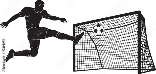 Soccer player kicking ball into goal net