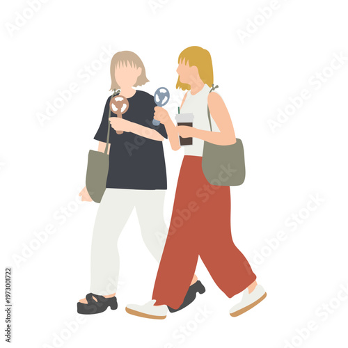 ハンディファンを持って歩く女性（夏・暑さ対策・外出）