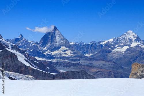 Mountain glacier Grenzgletscher panorama with summits Matterhorn and Dent Blanche (left to right) in Pennine Alps, Switzerland