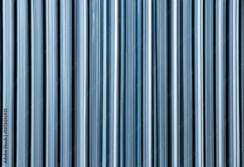 Obraz premium Vertical Lines of Blue Glass and Aluminum Building Facade