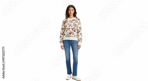 Young woman wearing jeans and sweater.