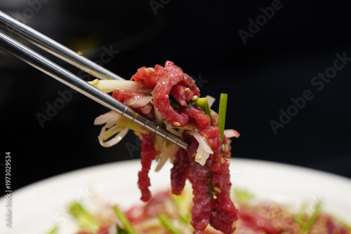 Korean style beef tartare, Yukhoe, seasoned with sesame oil and herbs