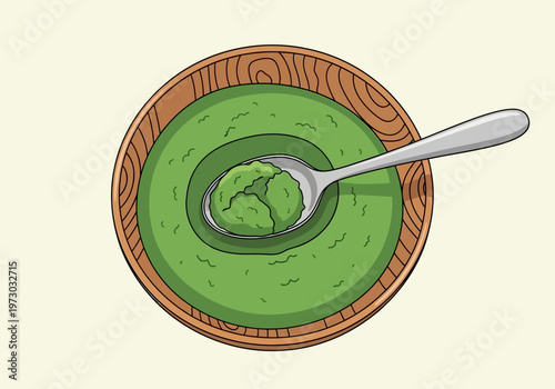 Green Smoothie Bowl with Spoonful of Green Mixture.