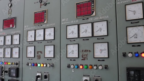 Electrical Control Panel with Meters Gauges and Indicator Lights at Industrial Power Plant Facility.
.
