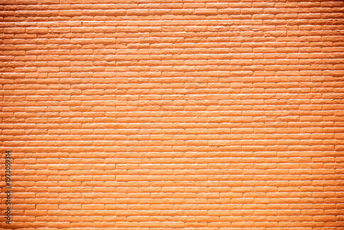 Background orange brick wall texture. Background masonry surface pattern. Background minimal architectural backdrop. Background urban construction design.