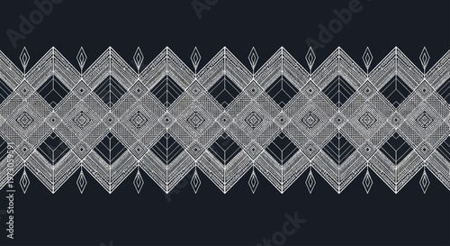 Black and white geometric pattern with rhombus and diamond shapes