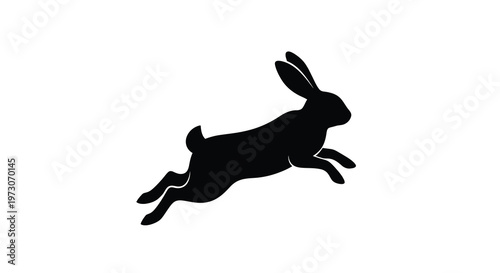 A black silhouette of a rabbit in mid leap against a white background