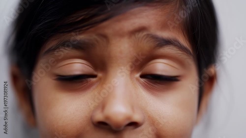 Curious child looking upward