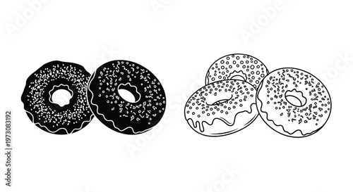 Four donuts in black and white featuring different frosting styles