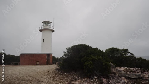 Bluff Hill point lighthouse timelapse strong wind on West Coast of Tasmania wild rivers.