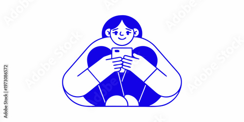 Woman comfortably seated engrossed in her mobile phone screen