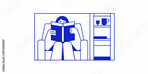 A woman sits reading a book in a comfortable minimalist setting