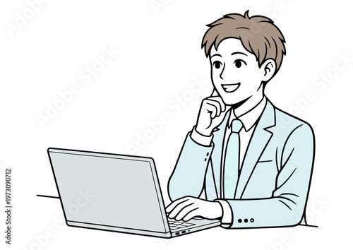 オフィスでノートパソコンを使う若い男性