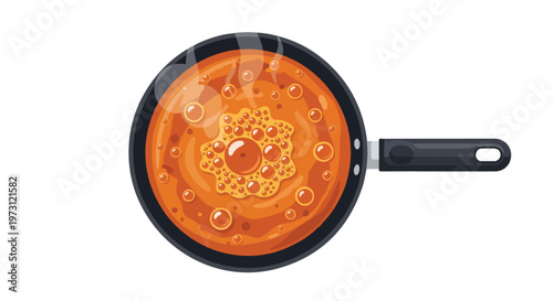 Vibrant orange liquid bubbling vigorously in a black frying pan, viewed from directly above, suggesting active cooking and culinary preparation