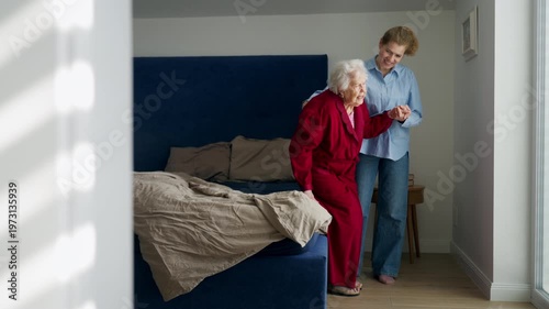 Daughter taking care of ill old mother.