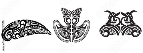 Three polynesian masks intricate black and white tribal art with symmetrical designs