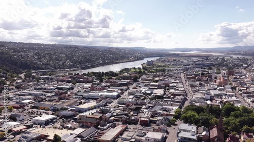 CBD of Launceston city in Tasmania – aerial panning over urban areas houses parks.