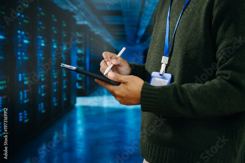 IT professional managing servers in data center, showcasing cloud computing, network infrastructure, cybersecurity