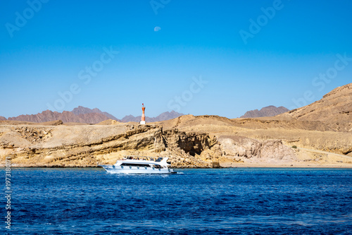 Red Sea Yacht and Beachgoers in Egypt