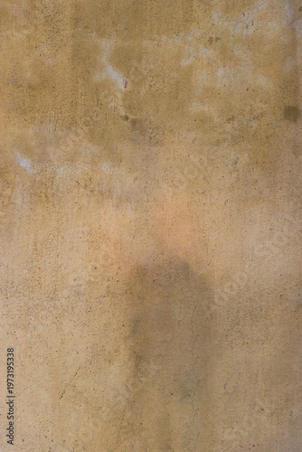 Bild auf Leinwand Full frame rustic yellow ochre plaster wall background featuring weathered textures with aged grunge details and subtle cracked surface for architectural and creative design