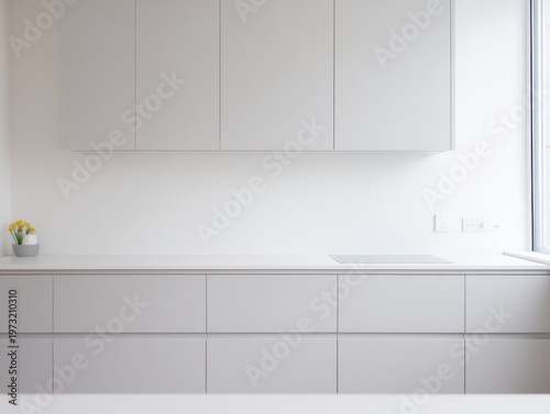 Modern Minimalist Kitchen Interior with Sleek Light Grey Cabinetry and Countertops