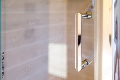 the shower door handle is close