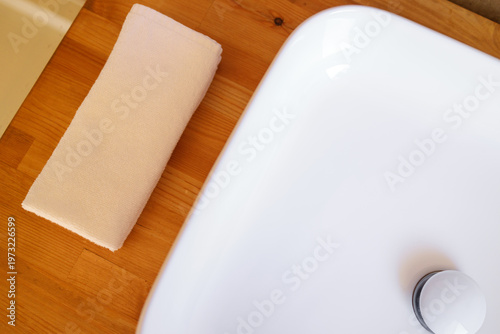 White sink with a towel, top view